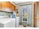 Functional laundry room with modern appliances, natural light, and storage at 2807 Graham Rd., Conway, SC 29526