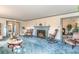 Spacious living room with fireplace, blue carpeting, and comfortable seating at 2807 Graham Rd., Conway, SC 29526