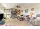 Comfortable living room with a brick fireplace, built-in shelves, and a ceiling fan at 2807 Graham Rd., Conway, SC 29526