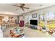 Cozy living room featuring large windows, neutral carpet, and lots of natural light at 2807 Graham Rd., Conway, SC 29526