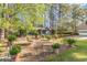 Outdoor brick patio area with decorative potted plants and comfortable seating at 2807 Graham Rd., Conway, SC 29526