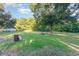 Expansive backyard with a large grassy area, mature trees, and a peaceful setting at 4426 Old Kings Hwy., Murrells Inlet, SC 29576