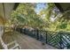 Spacious wood deck overlooking lush greenery, perfect for outdoor relaxation at 4426 Old Kings Hwy., Murrells Inlet, SC 29576