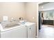 This laundry room features new appliances and access to the kitchen at 4426 Old Kings Hwy., Murrells Inlet, SC 29576