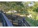 Wooden stairway provides access to the backyard and surrounding greenery at 4426 Old Kings Hwy., Murrells Inlet, SC 29576