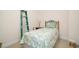 A simple bedroom featuring a bed, side table, and ladder at 206 Mossy Stone Ct. # 1605, Murrells Inlet, SC 29576