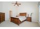Main bedroom with ceiling fan, warm lighting, and a spacious closet at 206 Mossy Stone Ct. # 1605, Murrells Inlet, SC 29576