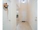 Bright, two-story foyer features neutral colors and tile flooring at 206 Mossy Stone Ct. # 1605, Murrells Inlet, SC 29576