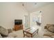 Cozy living room with comfortable sofas and a sunroom in the background at 206 Mossy Stone Ct. # 1605, Murrells Inlet, SC 29576