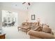 Spacious living room showing comfortable seating and access to sunroom at 206 Mossy Stone Ct. # 1605, Murrells Inlet, SC 29576