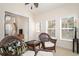 Bright sunroom with comfortable seating with easy access to the outdoors at 206 Mossy Stone Ct. # 1605, Murrells Inlet, SC 29576