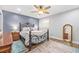 Bright bedroom with a metal bed frame and full-length mirror at 1412 Hemingway St., Myrtle Beach, SC 29577