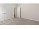 Well-lit bedroom with carpet and double doors to closet at 315 Hayloft Circle, Conway, SC 29526