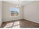 Bright dining area with hardwood flooring and a chandelier at 315 Hayloft Circle, Conway, SC 29526