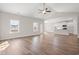 Spacious living room with hardwood floors and an open concept kitchen at 315 Hayloft Circle, Conway, SC 29526