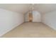 Large bonus room with carpet and adjoining closet/storage space at 323 Trestle Way, Conway, SC 29526