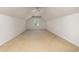 Spacious bonus room with carpeted floors, white walls, and a window for natural light at 323 Trestle Way, Conway, SC 29526