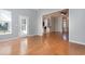 Spacious living area with hardwood flooring and easy access to the kitchen at 323 Trestle Way, Conway, SC 29526