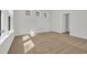 Cozy bedroom with neutral carpet, ample natural light from windows, and a clean, modern aesthetic at 389 Sun Colony Blvd., Longs, SC 29568