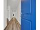 Bright entryway with luxury vinyl plank flooring leading to the living spaces of the house at 389 Sun Colony Blvd., Longs, SC 29568