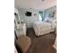 Relaxing bedroom with a comfy bed, plenty of sunlight, and stylish decor at 1101 Possum Trot Rd. # B302, North Myrtle Beach, SC 29582