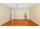 Bright bedroom with hardwood floors and a ceiling fan at 244 George Washington Trail, Georgetown, SC 29440