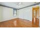 Bedroom with hardwood floors, natural light, and closet at 244 George Washington Trail, Georgetown, SC 29440