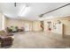 Large garage space with staircase and storage cabinets at 244 George Washington Trail, Georgetown, SC 29440