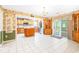 Well-equipped kitchen with tile flooring, wooden cabinets, and stainless steel appliances at 244 George Washington Trail, Georgetown, SC 29440