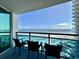 Balcony with ocean view and seating at 107 S Ocean Blvd. # 808, Myrtle Beach, SC 29577
