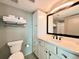 Modern bathroom with white cabinetry and updated fixtures at 107 S Ocean Blvd. # 808, Myrtle Beach, SC 29577