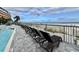 Beach chairs with a pier in the distance at 107 S Ocean Blvd. # 808, Myrtle Beach, SC 29577