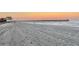 Beach at sunrise with pier in the distance at 107 S Ocean Blvd. # 808, Myrtle Beach, SC 29577