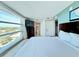 Inviting bedroom with ensuite bathroom and large window at 107 S Ocean Blvd. # 808, Myrtle Beach, SC 29577