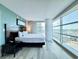 Bright bedroom features a large window with city views at 107 S Ocean Blvd. # 808, Myrtle Beach, SC 29577