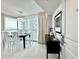 Bright dining area features modern light fixtures and views at 107 S Ocean Blvd. # 808, Myrtle Beach, SC 29577