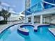 Modern pool with a meandering lazy river and nearby beach at 107 S Ocean Blvd. # 808, Myrtle Beach, SC 29577