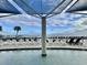Bright, outdoor pool area with lots of chairs overlooking the ocean at 107 S Ocean Blvd. # 808, Myrtle Beach, SC 29577