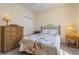 Comfortable bedroom with Paris-themed bedding and rattan furniture at 237 Cloverleaf Dr., Longs, SC 29568