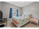 Neutral bedroom with a bed, bedside table, and a window with natural light at 237 Cloverleaf Dr., Longs, SC 29568