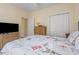 Bedroom with Paris-themed bedding, rattan furniture, and a closet at 237 Cloverleaf Dr., Longs, SC 29568