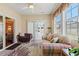 Inviting sun room with comfortable seating, a ceiling fan, and bright views through the sliding doors at 237 Cloverleaf Dr., Longs, SC 29568