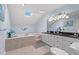 Bathroom with double vanity, jetted tub, and skylight at 508 21St Ave. N, North Myrtle Beach, SC 29582