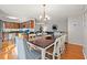 Dining room with a large table, chandelier, and hardwood floors at 508 21St Ave. N, North Myrtle Beach, SC 29582
