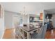 Dining room with large table, chandelier, and hardwood floors at 508 21St Ave. N, North Myrtle Beach, SC 29582