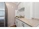 Small kitchen with stainless steel appliances at 508 21St Ave. N, North Myrtle Beach, SC 29582