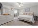 Spacious main bedroom with king-size bed and ceiling fan at 508 21St Ave. N, North Myrtle Beach, SC 29582