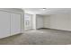 Spacious bedroom with double closets and neutral carpeting at 217 Southern Breezes Circle, Murrells Inlet, SC 29576