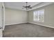 Large bedroom with ceiling fan and plush carpeting at 217 Southern Breezes Circle, Murrells Inlet, SC 29576