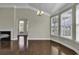 Spacious dining room with hardwood floors and views to backyard at 217 Southern Breezes Circle, Murrells Inlet, SC 29576